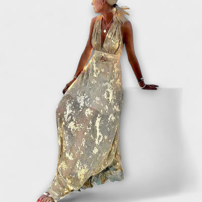 Flowing dress with V-neck and sequin details